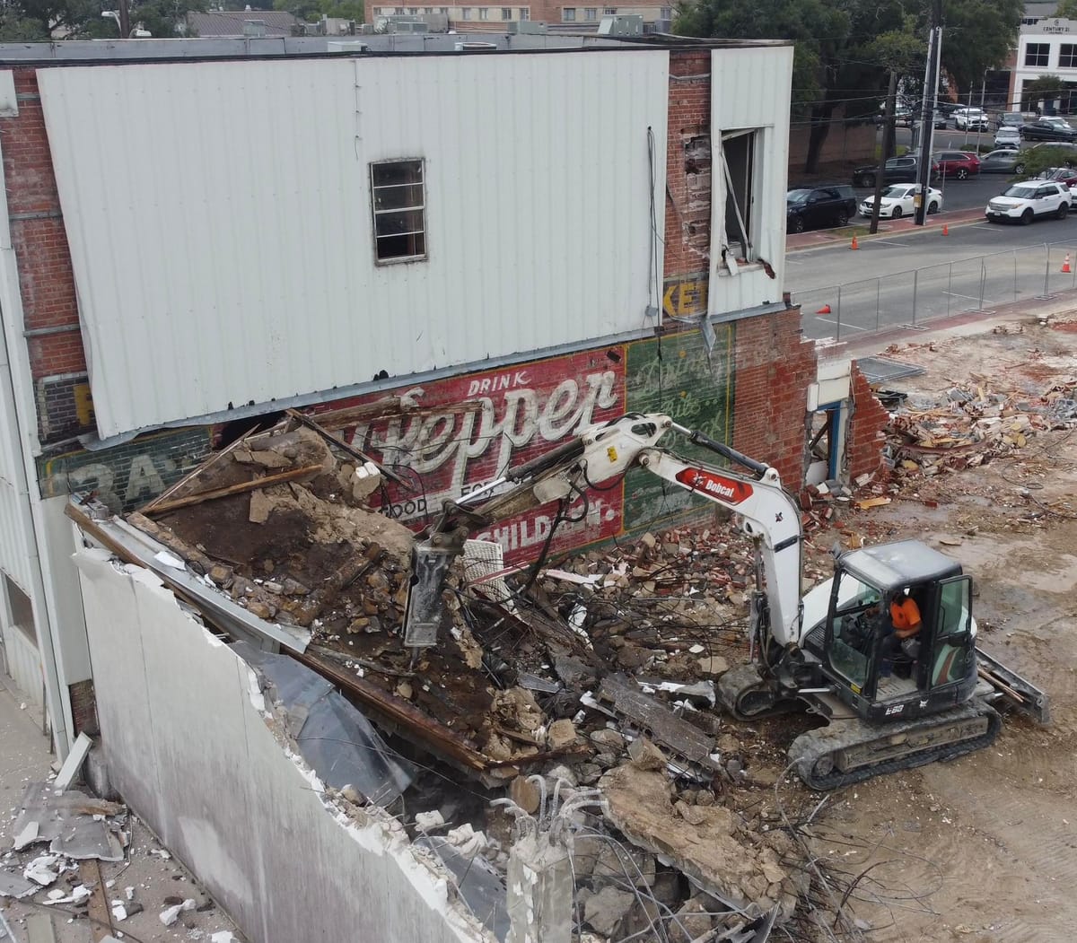 Lufkin Discovers Vintage Dr. Pepper Mural During Jailhouse Redevelopment